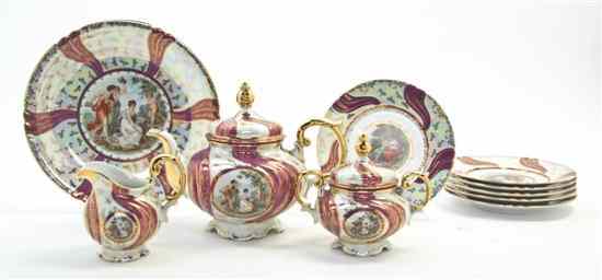 Appraisal: A German Porcelain Dessert Service Volkstedt comprising a cake plate