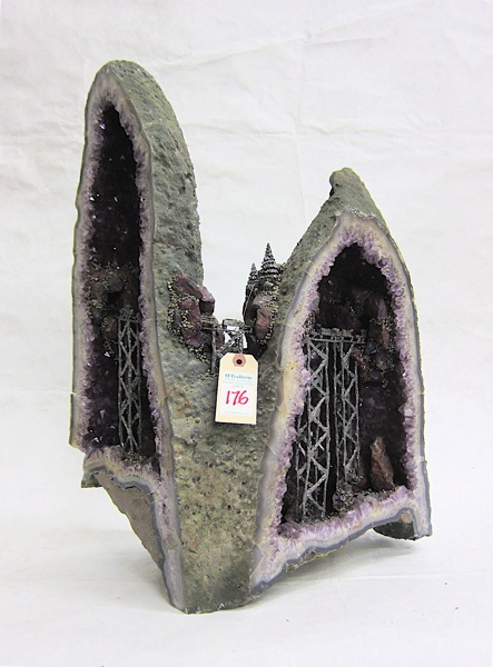 Appraisal: AMETHYST QUARTZ GEODE AND PEWTER SCULPTURE featuring an integral pair