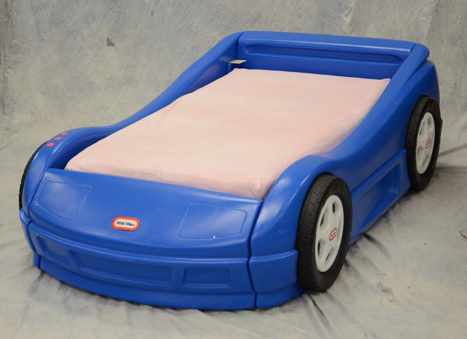 Appraisal: Blue Little Tikes racecar bed w l - max height