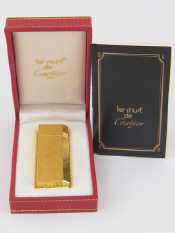 Appraisal: An unused Cartier gas lighter Le Must de Cartier in