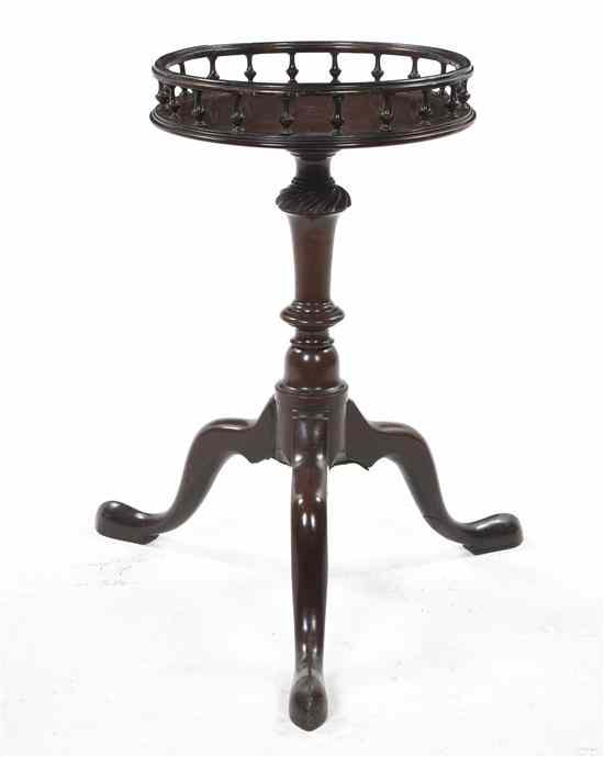 Appraisal: A George III Mahogany Candlestand the circular spindled galleried top