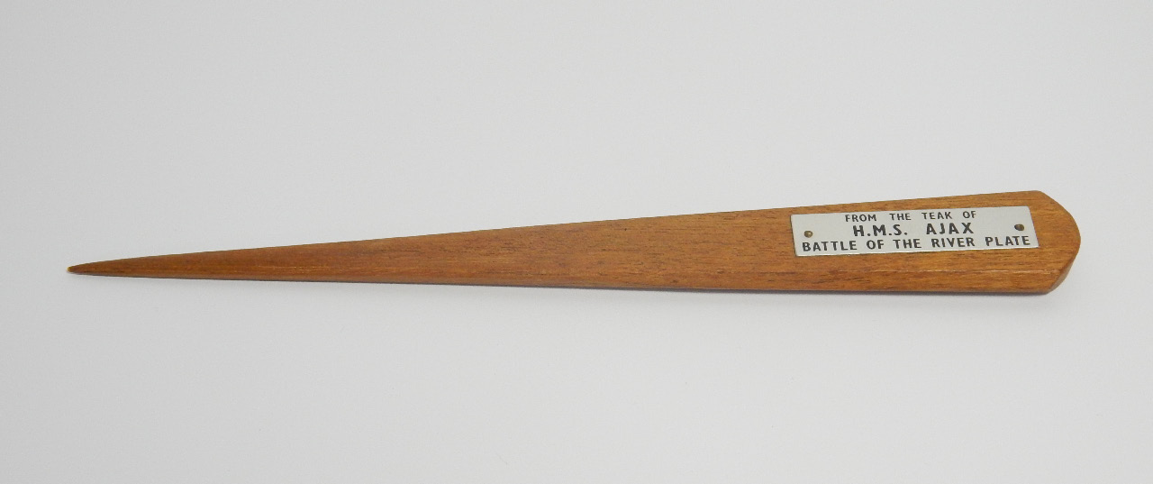 Appraisal: A wooden paper knife made 'From The Teak of HMS