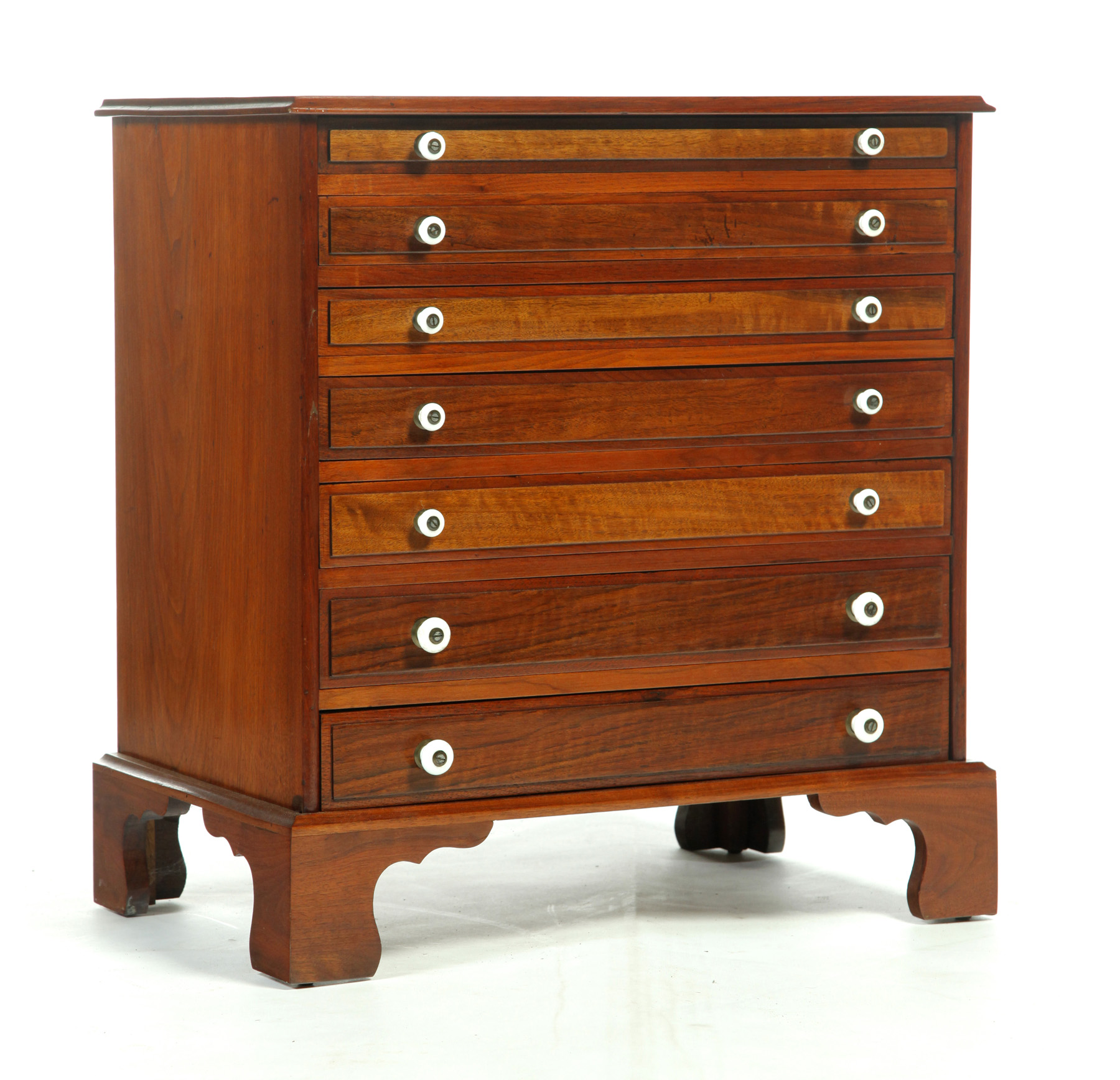 Appraisal: SEVEN-DRAWER SPOOL CABINET American ca walnut with pine and poplar