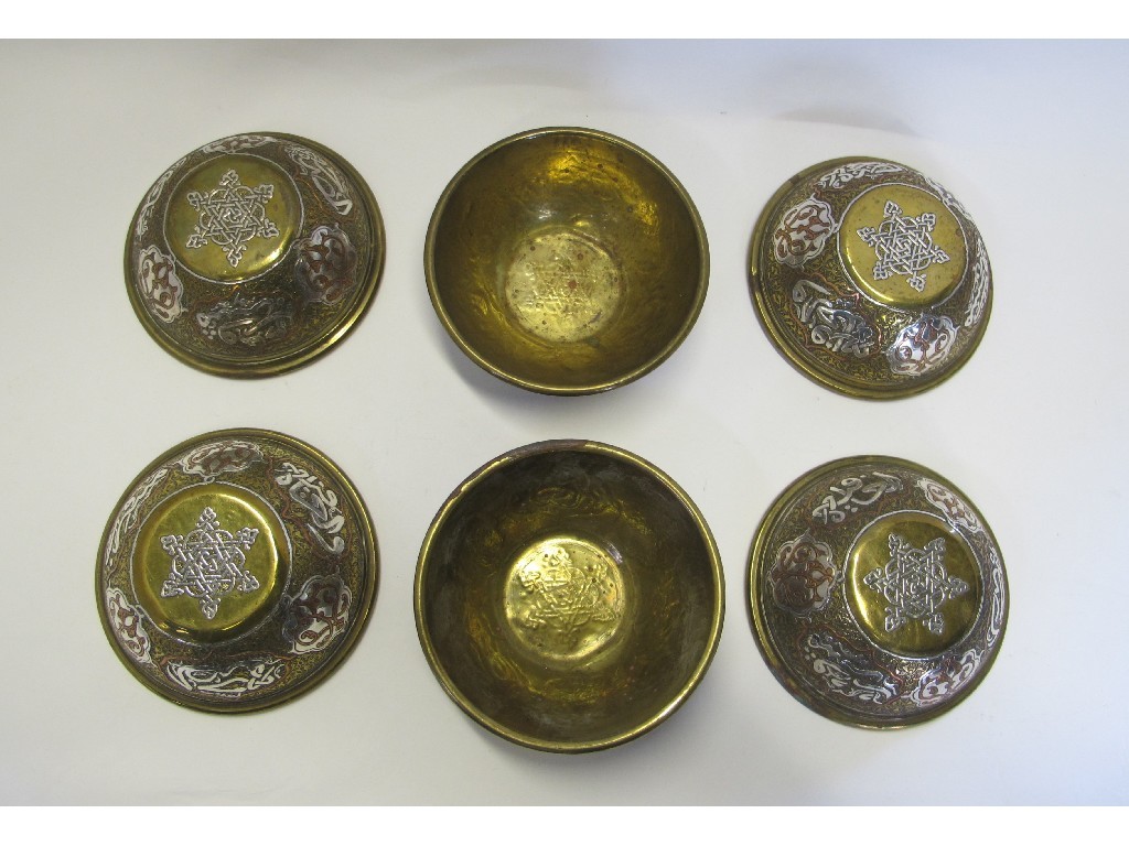 Appraisal: Six Persian brass bowls with inlaid copper and silvered decoration