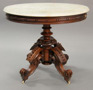 Appraisal: Victorian walnut oval marble top table on carved oval support