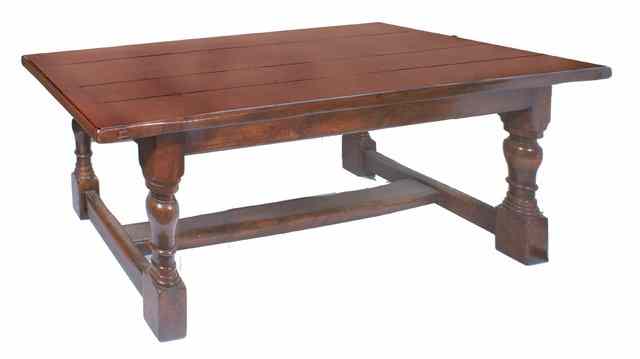 Appraisal: AN OAK REFECTORY TABLE the four plank top with cleated