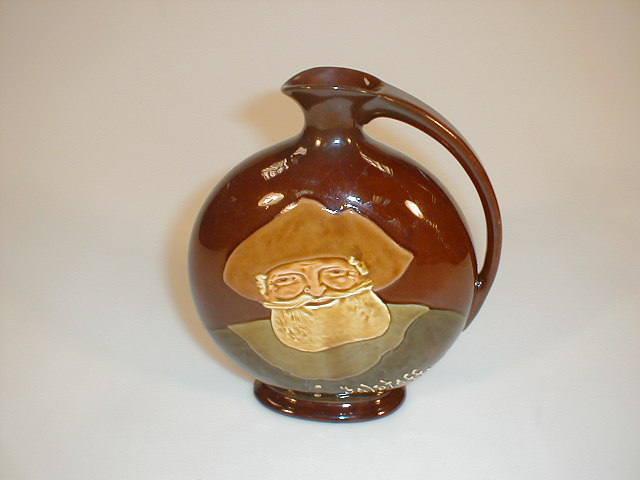 Appraisal: A Royal Doulton Kingsware Falstaff moon flask jug produced for