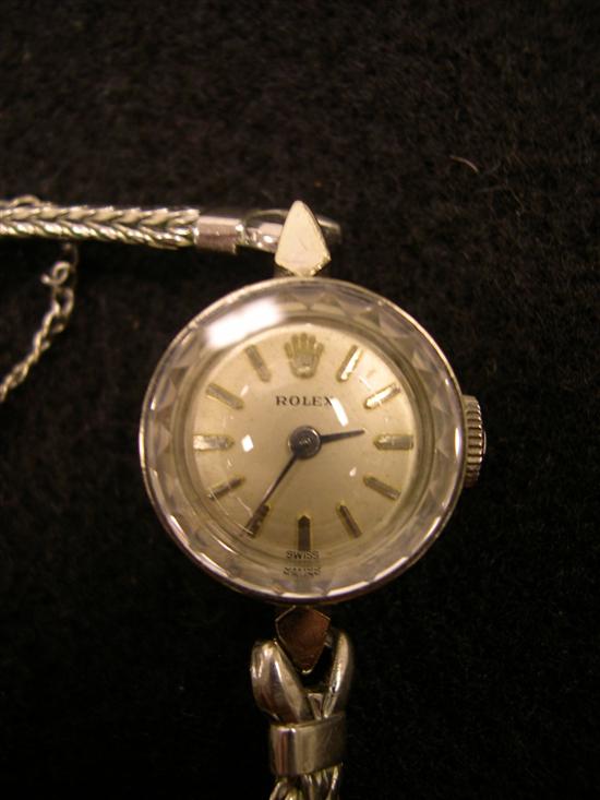 Appraisal: JEWELRY One lady's K white gold Rolex cocktail wristwatch strap