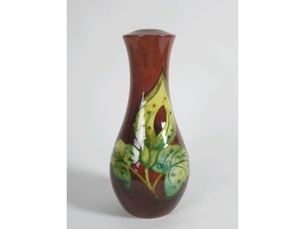 Appraisal: A Moorcroft baluster Lamp Base with flambe firing in arum