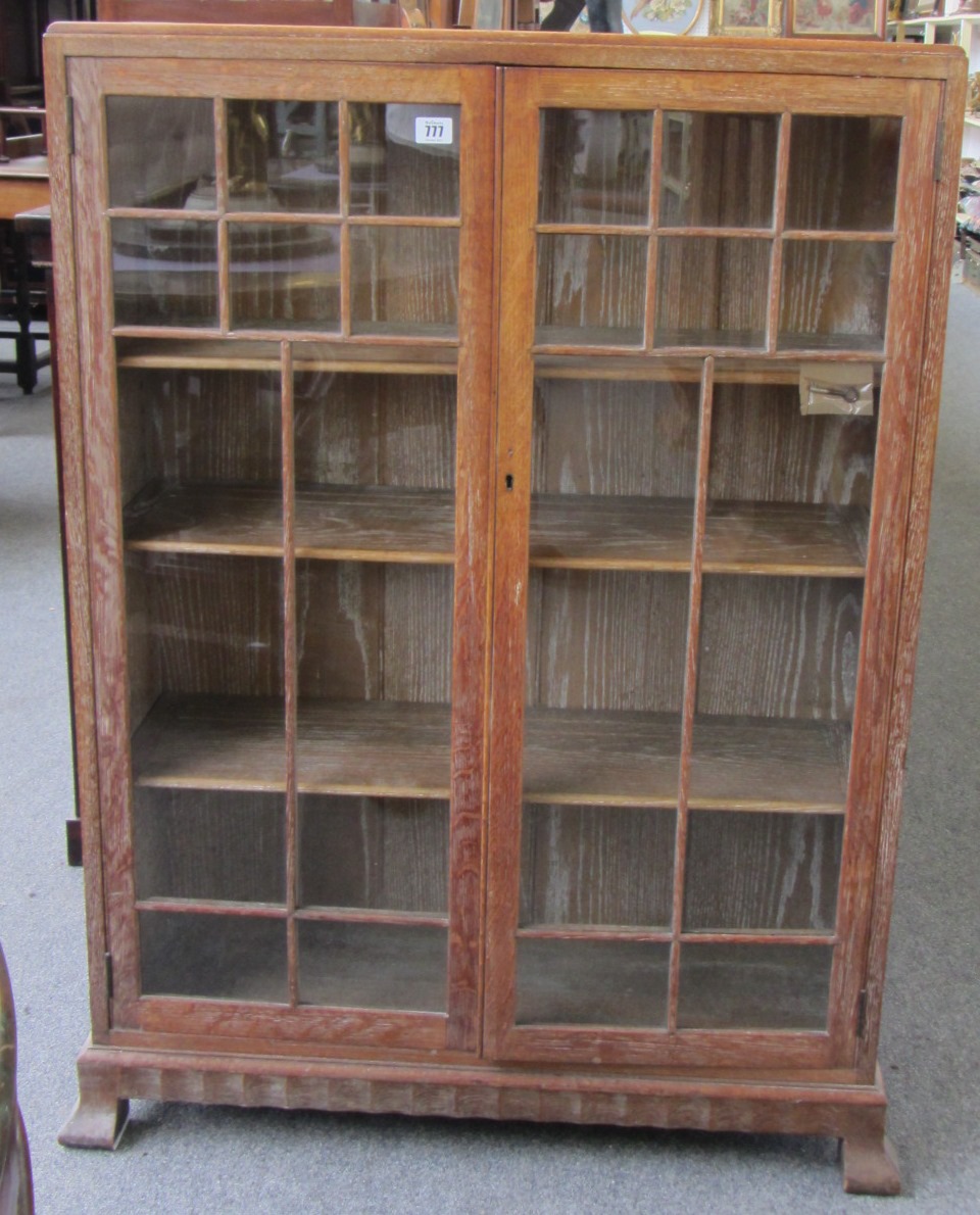 Appraisal: An early th century limed oak floor standing glazed two