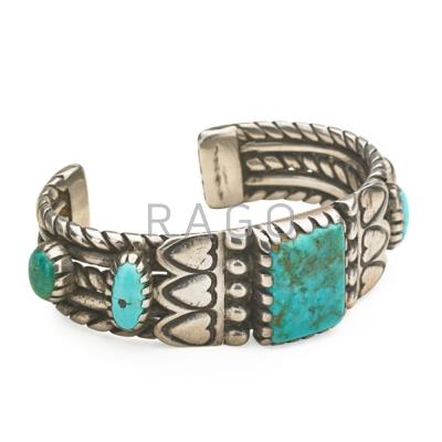 Appraisal: NAVAJO BRACELET Silver and turquoise wire twist cuff with heart