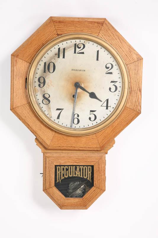 Appraisal: INGRAHAM REGULATOR WALL CLOCK Time only clock in an oak