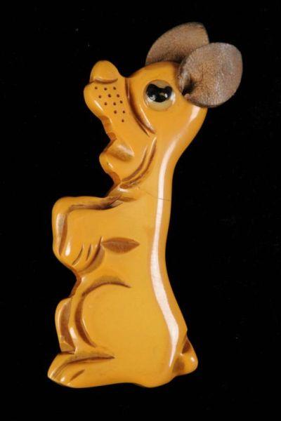 Appraisal: Bakelite Begging Dog Pin Description Leather ears and glass eye