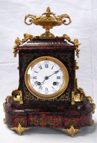 Appraisal: Boulle Mantle Clock with cast ormolu mounts urn finial and