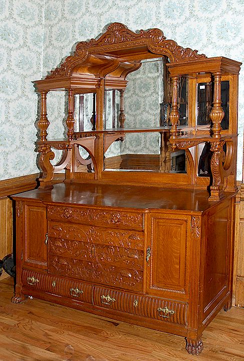 Appraisal: Massive Oak Sideboard Probably R J Horner A heavily carved