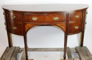 Appraisal: Sheraton style demi-lune banded mahogany sideboard on legs With inlaid