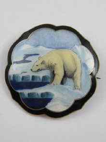 Appraisal: A Scandinavian white metal tests silver brooch depicting a polar