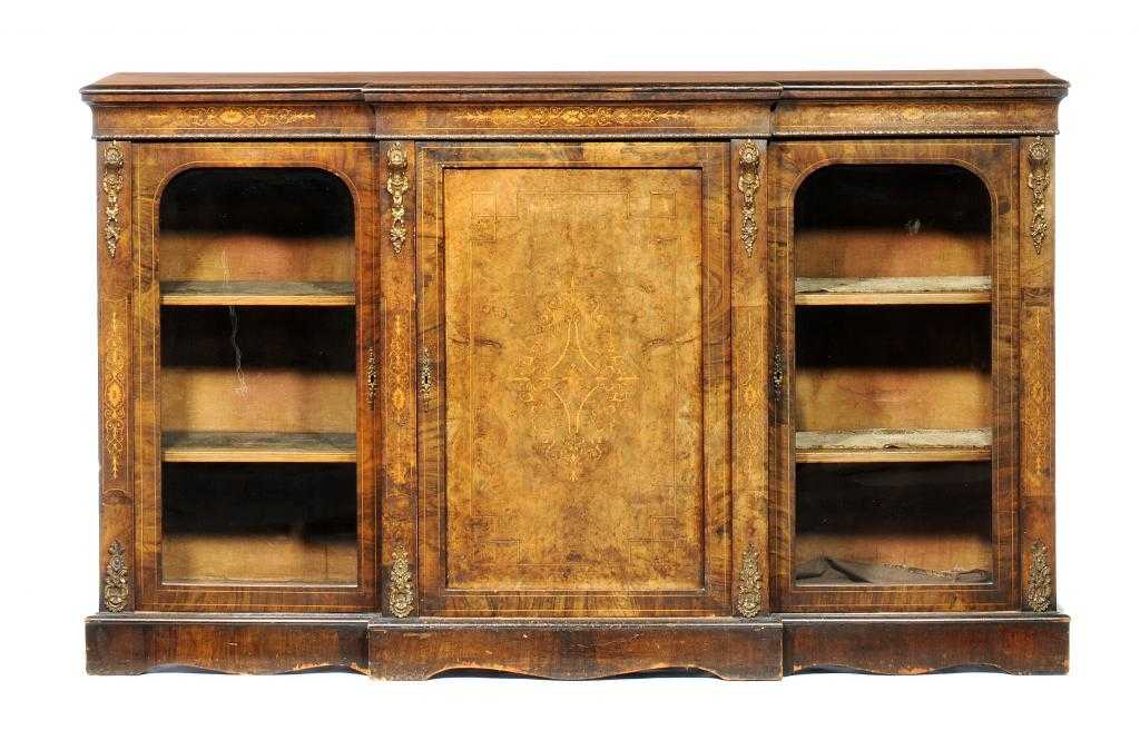 Appraisal: A VICTORIAN ORMOLU-MOUNTED WALNUT BREAKFRONT SIDE CABINET the frieze and