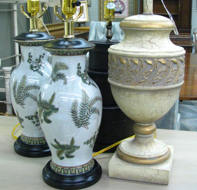 Appraisal: Four lamps including a leather stacking trunk type two matching