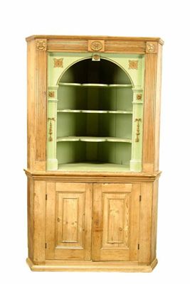 Appraisal: A late George III pine and parcel gilt corner cupboard