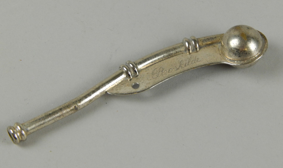 Appraisal: A silver plated Bosun's whistle inscribed 'Roskilde' cm Provenance Butterfields