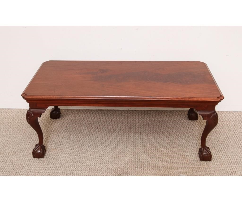 Appraisal: Chippendale style mahogany coffee table with shell carved legs and