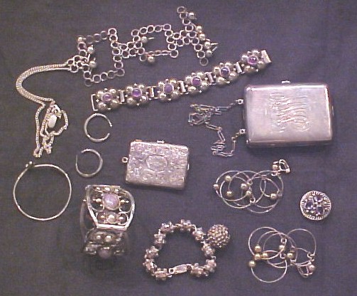 Appraisal: Jewelry including sterling items including a large bracelet a chain