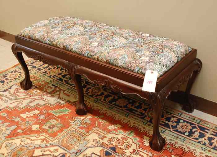 Appraisal: CHIPPENDALE STYLE MAHOGANY BENCH having six ball-and-claw footed legs supporting