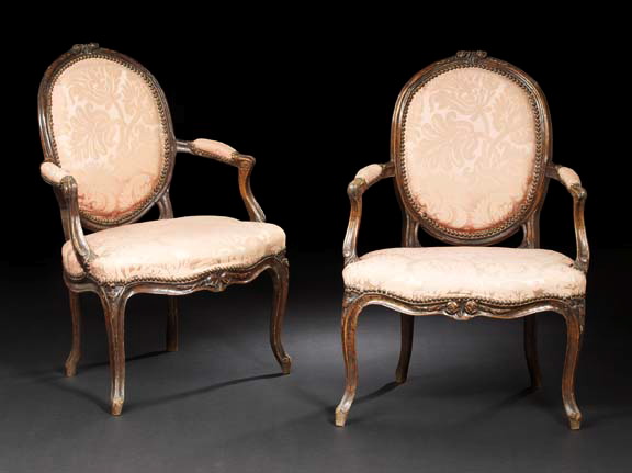 Appraisal: Signed Pair of Louis XV Carved Fruitwood Fauteuils mid- th