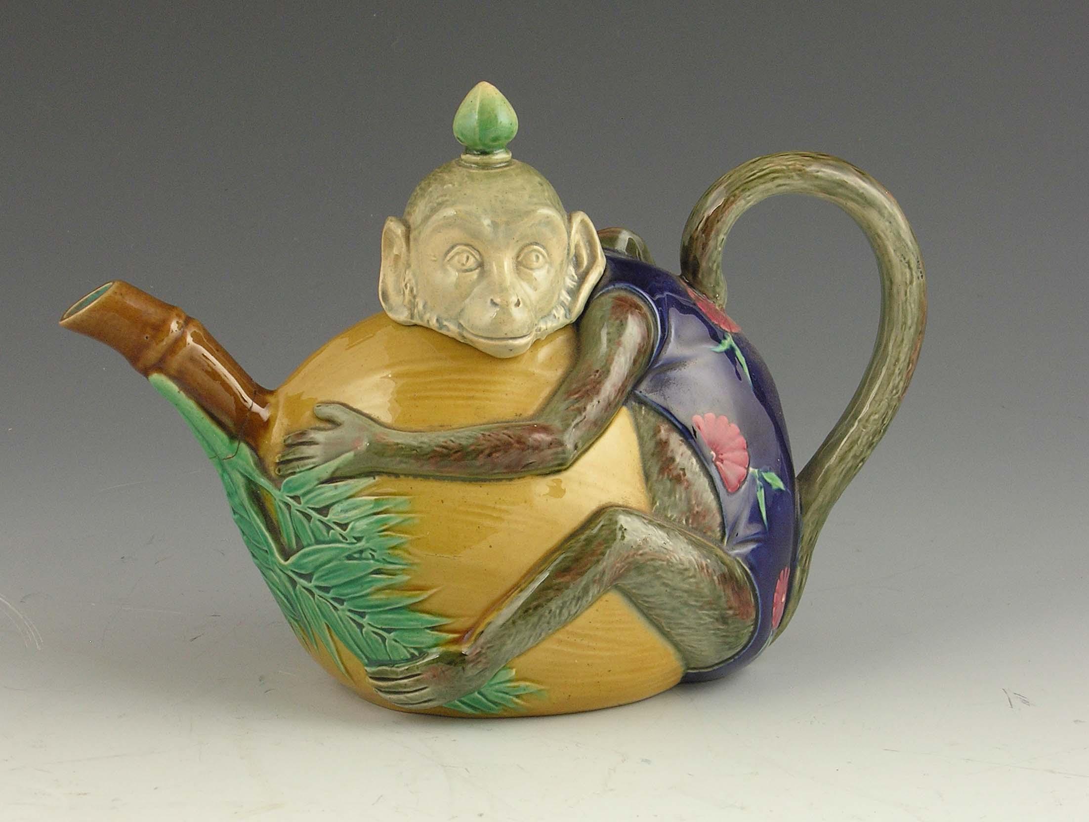 Appraisal: A Minton majolica monkey teapot and cover