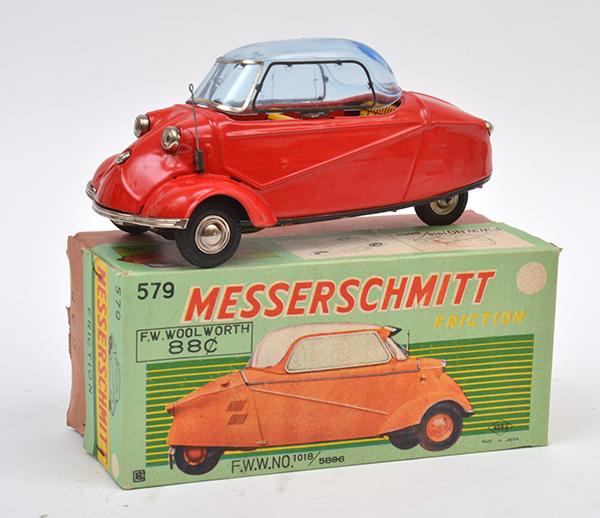 Appraisal: BANDAI BANDAI MESSERSCHMITT TINPLATE FRICTION CAR RED WITH BLUE TINTED