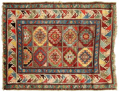 Appraisal: Moghan Kazak style rug five pairs rectangular panels on brick