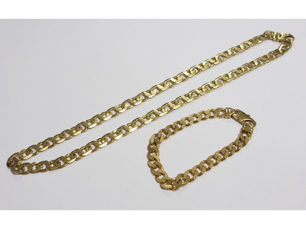 Appraisal: Nine carat gold flat curb link neckchain with matching bracelet