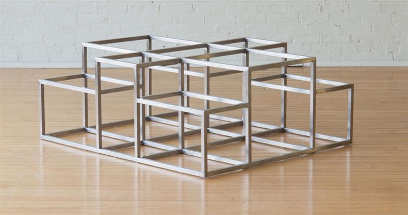 Appraisal: MICHEL BOYER STAINLESS STEEL LOW TABLE Lacking glass top x