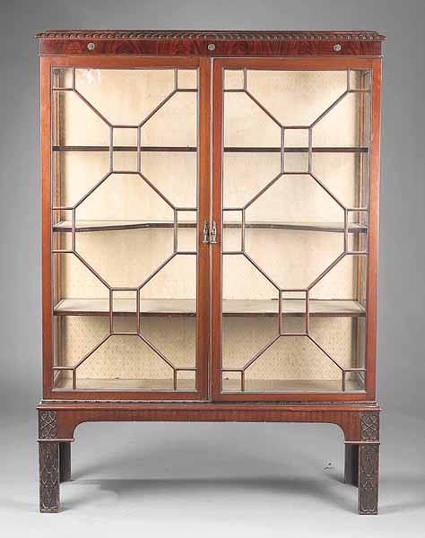 Appraisal: A Chippendale-Style Carved Mahogany Vitrine Cabinet the gadrooned top above