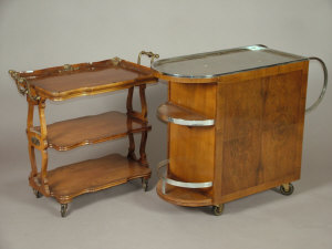 Appraisal: A walnut three tier trolley late th century the tiers