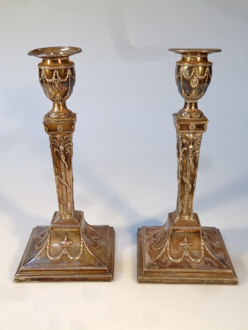 Appraisal: A pair of thC Old Sheffield plate candlesticks of classical