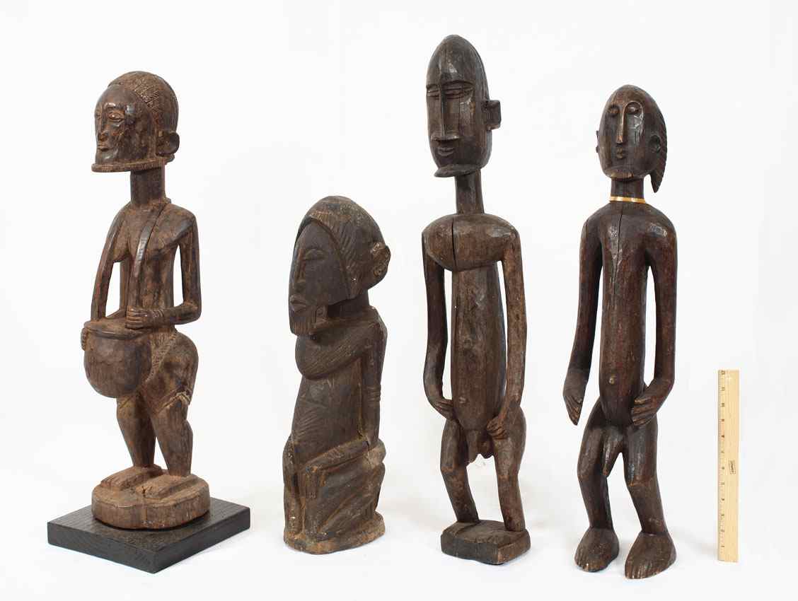 Appraisal: CARVED AFRICAN SMALL DOGON FIGURES '' x '' x ''