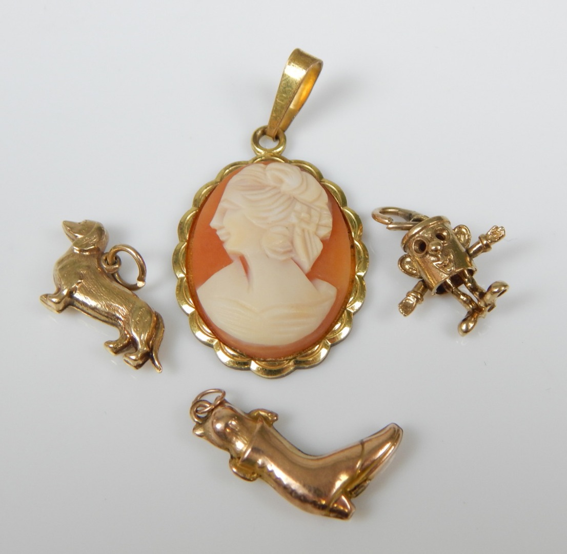 Appraisal: Various charms to include a dog cat in a boot