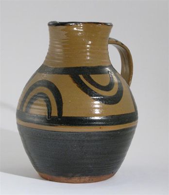 Appraisal: Michael Cardew - a Winchcombe Pottery earthenware jug painted with