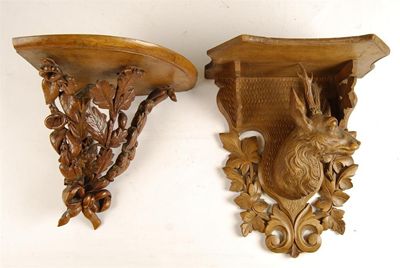 Appraisal: A th century Black Forest carved wood wall bracket with