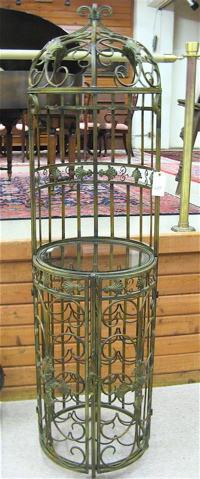 Appraisal: BRONZED WROUGHT IRON WINE SERVING STAND AND CELLAR The cylindrical