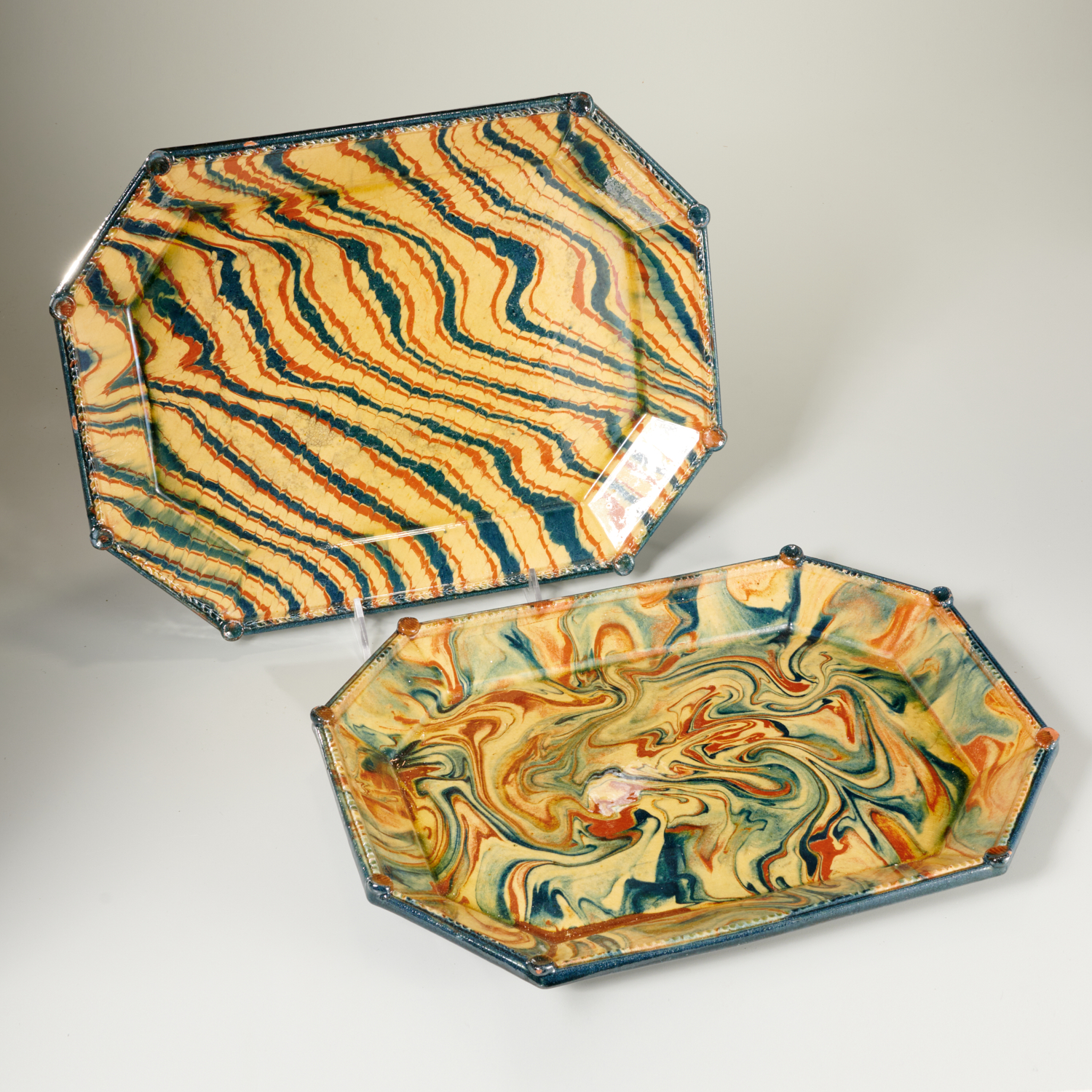 Appraisal: SAMPIGNY LES MARANGES MARBLEIZED GLAZED TRAYS th st c French