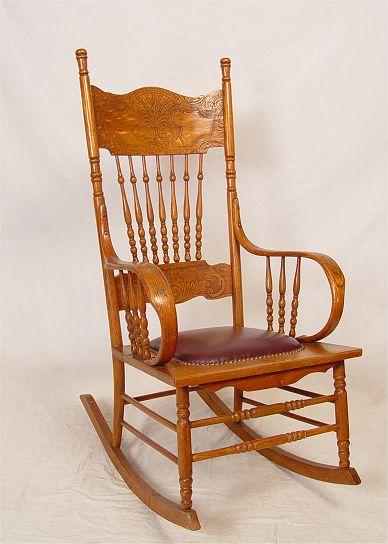 Appraisal: LATE VICTORIAN OAK PRESSBACK ROCKER Newer leather upholstery Measures ''