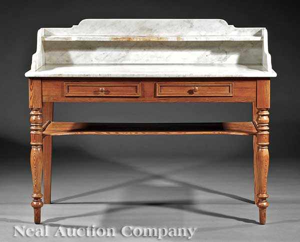 Appraisal: An English Carved Pine Dressing Table th c marble top