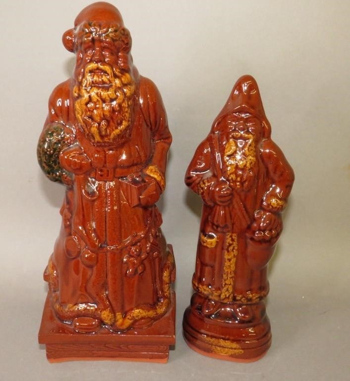 Appraisal: FOLK ART REDWARE SANTAS BY C NED FOLTZca both cast