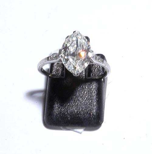 Appraisal: DIAMOND RING ca Platinum Elegant fine 'Solitaire' model the top