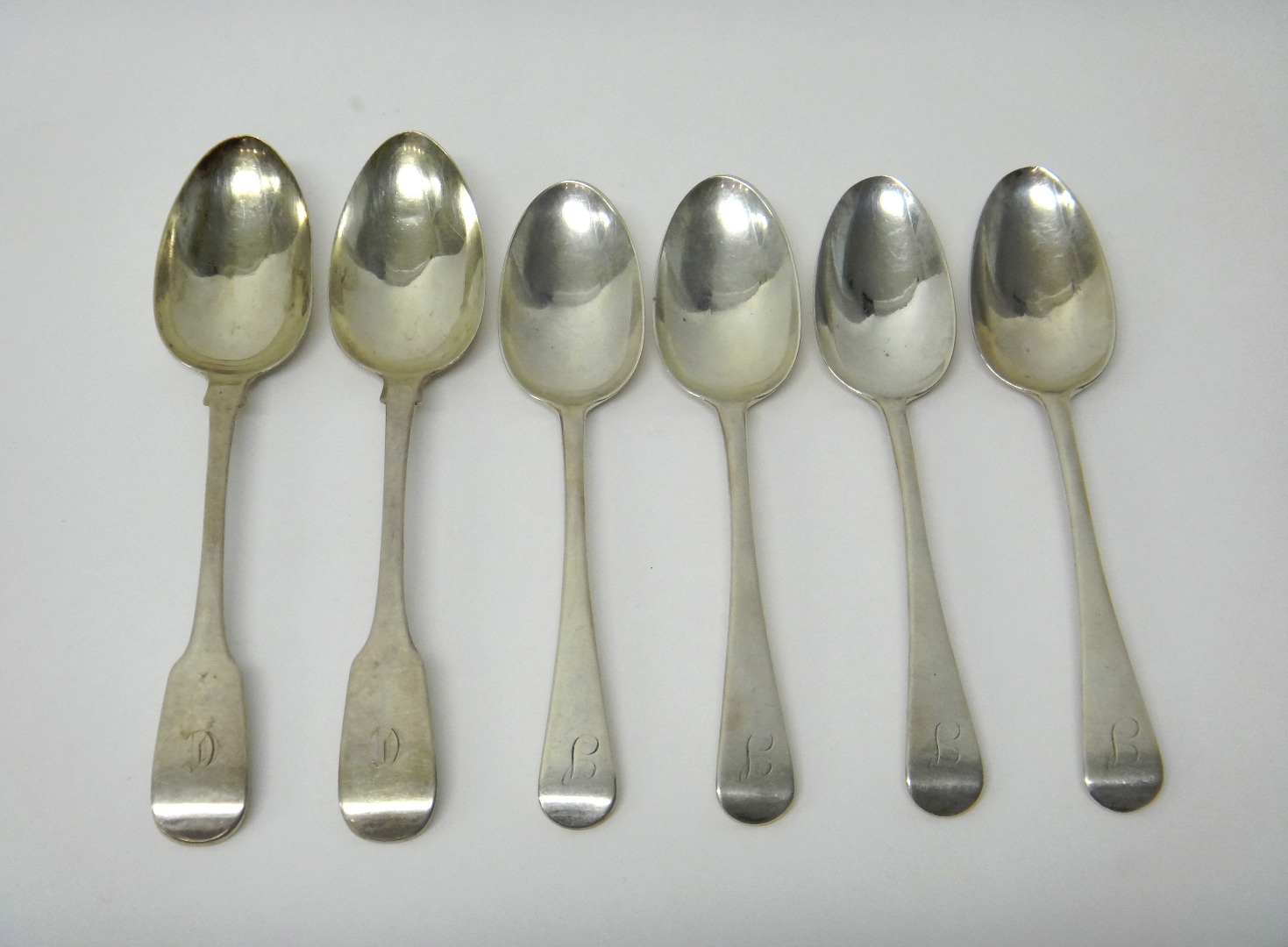 Appraisal: Four silver Old English pattern tablespoons initial engraved London and