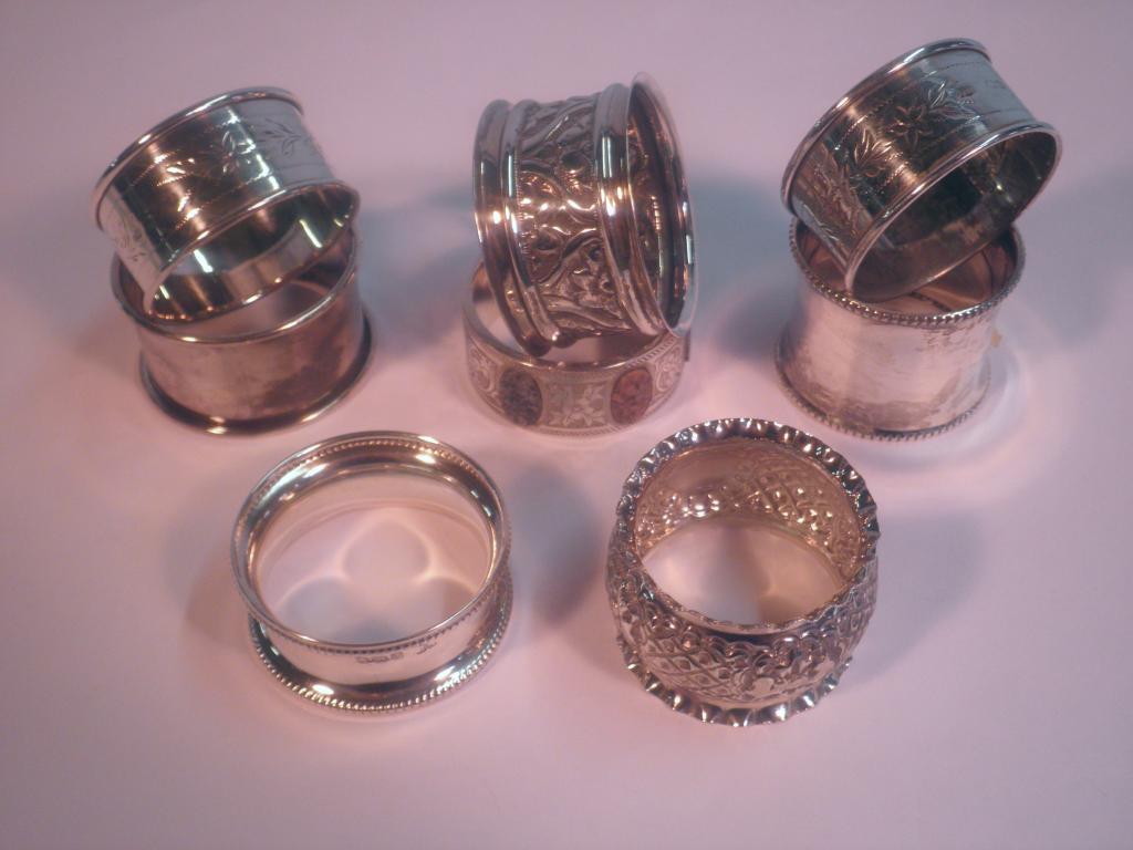 Appraisal: Eight silver napkin rings various dates together with a pair