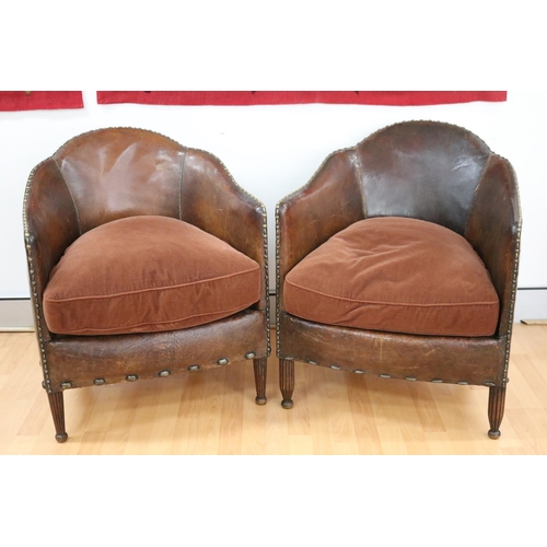 Appraisal: Pair of vintage French leather tub armchairs with studded trim